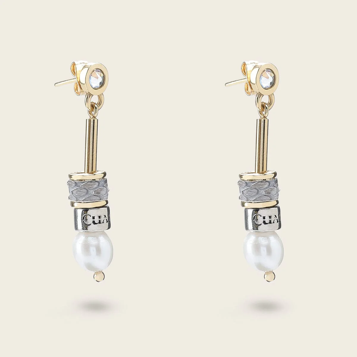 Aretes para dama en piel genuina de pitón - Imagen 3